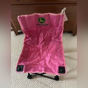 Child / girl pink, portable folding chair branded with the John Deere logo.